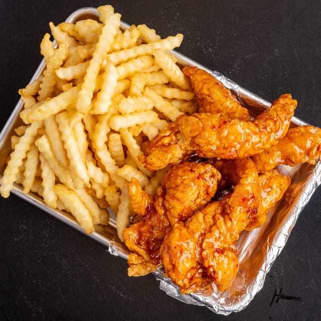 6pc. Flavored Chicken Strips with Fries.